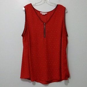 In Every Story red sleeveless blouse